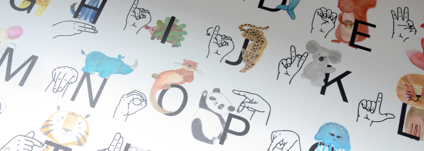 Buchstaben mit Bildsymbolen und Gebärdensprache